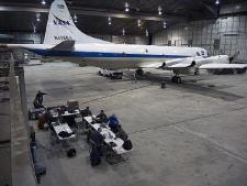 The NASA P-3B sits in the hangar at Thule Air Base