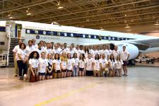2019 NASA Student Airborne Research Program (SARP) students, mentors and faculty pose in front of the NASA DC-8 airborne laboratory. Credits: Megan Schill / NASA SARP