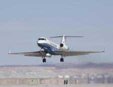 NASA's C-20A research aircraft takes off with the UAVSAR instrument attached below during an earlier flight from Edwards Air Force Base near Palmdale, California. Credits: NASA