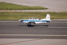 T-34 Chase Plane ready to accompany AV-6 Global Hawk coming in for landing at Wallops Flight Facility (2012)